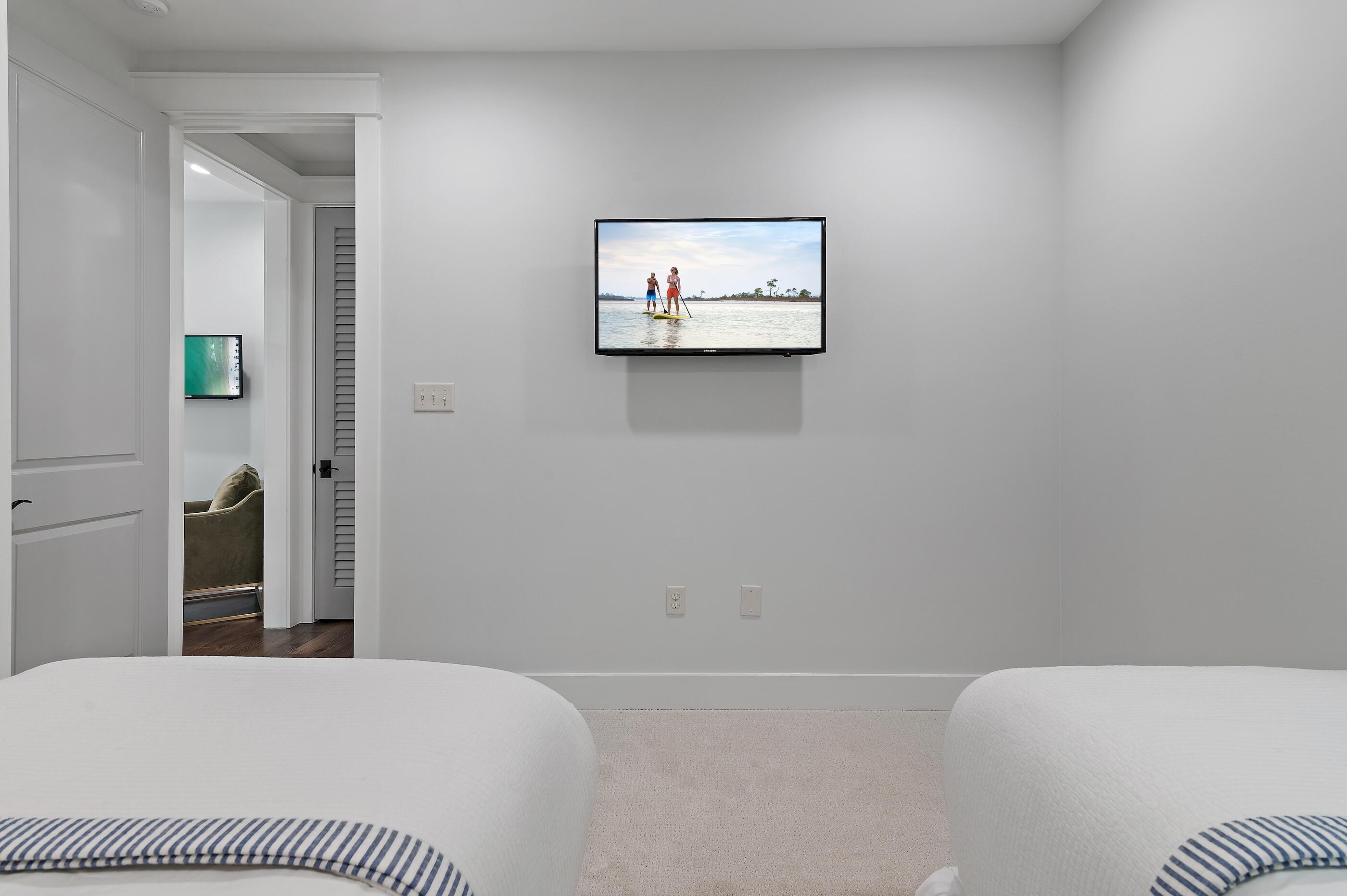 199 Anchor Rode Circle Santa Rosa Beach, FL 32459 - Photo 26 of 43 a bedroom with a bed and wall painting