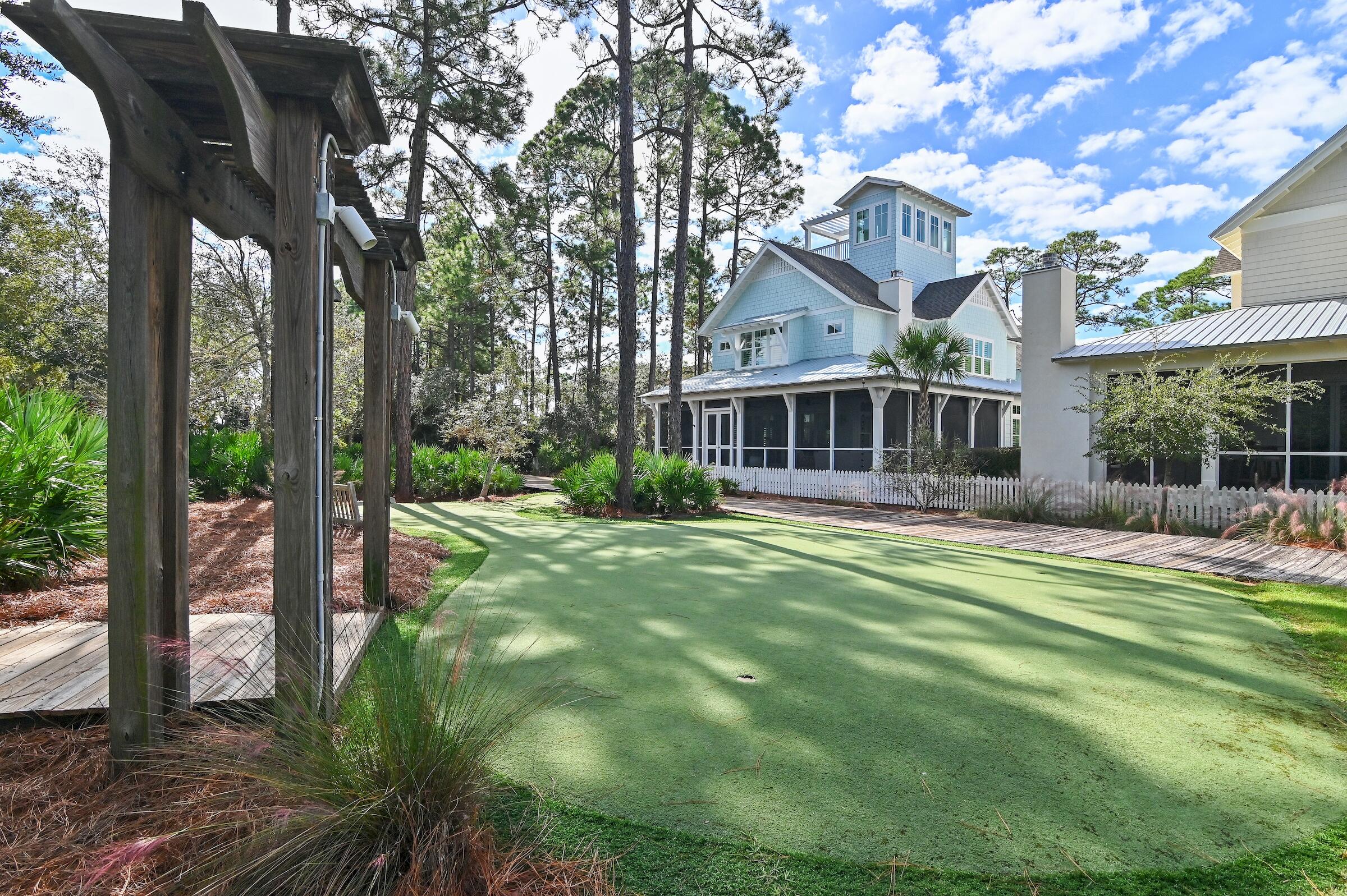 199 Anchor Rode Circle Santa Rosa Beach, FL 32459 - Photo 35 of 43 a front view of a house with a yard table and chairs