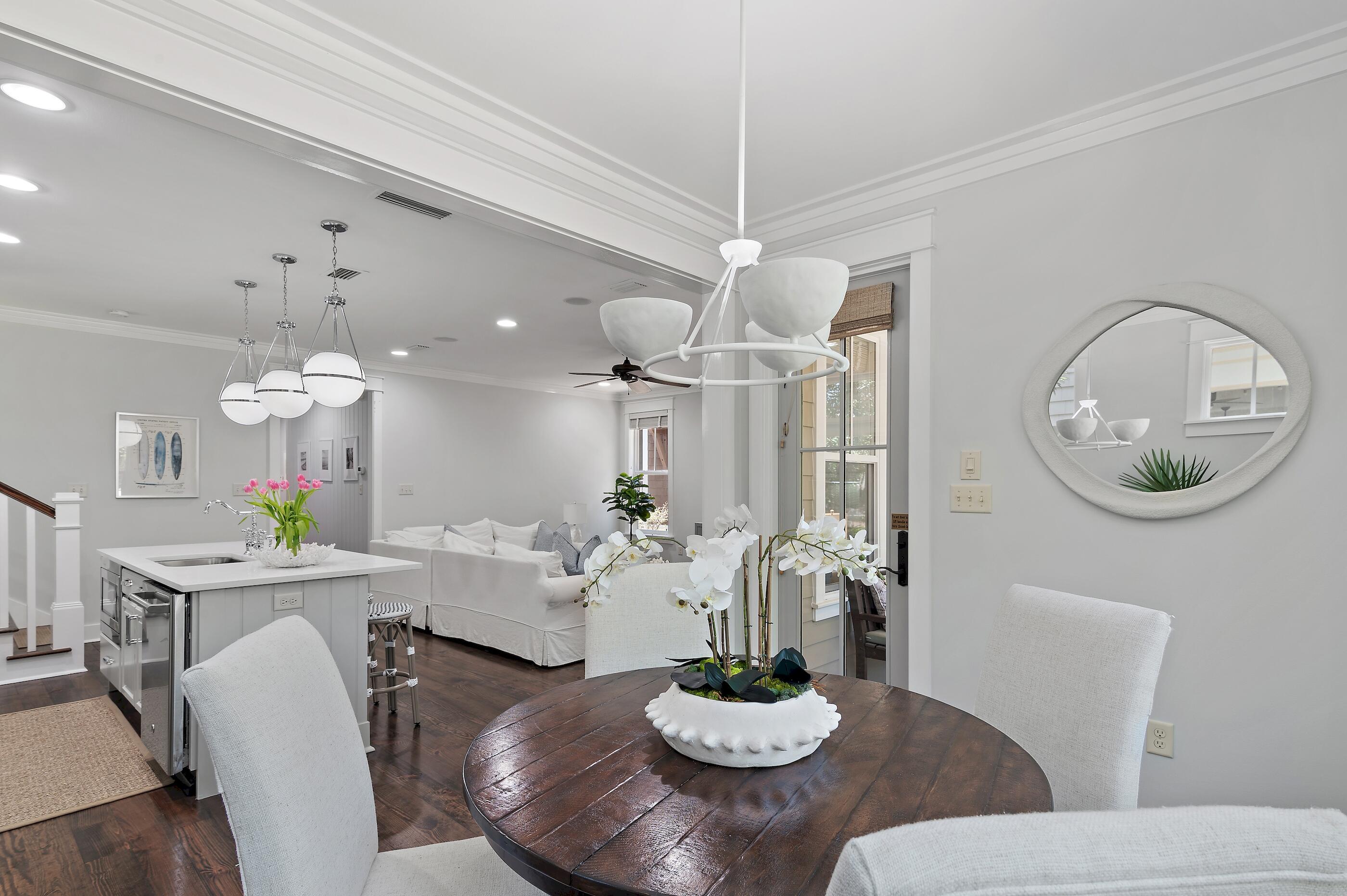 199 Anchor Rode Circle Santa Rosa Beach, FL 32459 - Photo 10 of 43 a view of a dining room with furniture and a chandelier