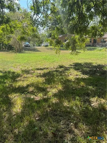 a view of outdoor space and yard