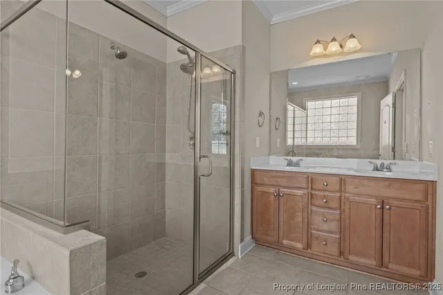a bathroom with a shower a toilet and sink