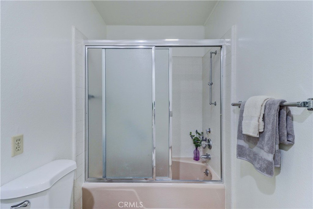 2123 Ronda Granada, Unit A Laguna Woods, CA 92637 - Photo 25 of 34 a bathroom with a shower and a sink