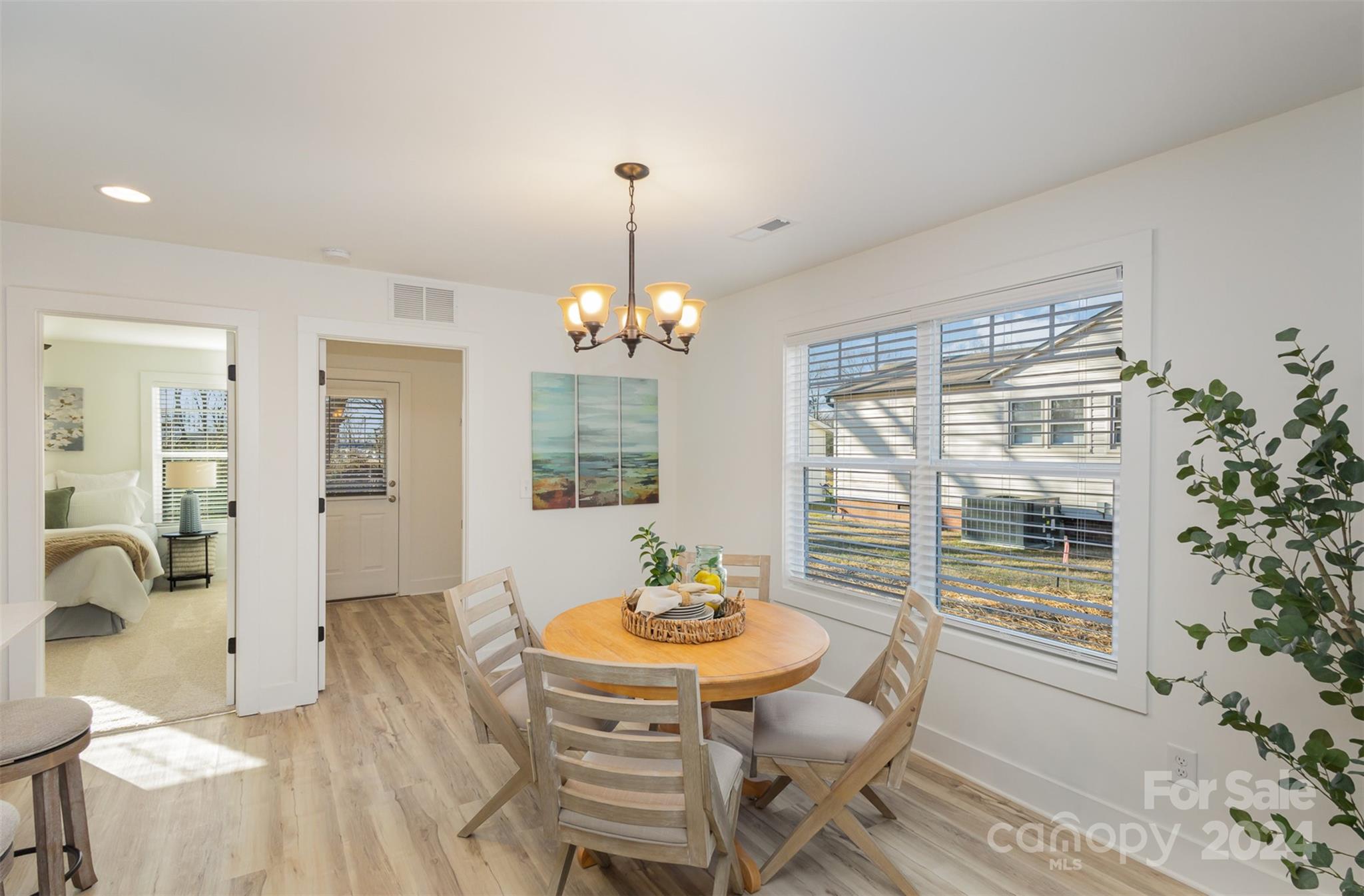 2832 South Ridge Avenue Concord, NC 28025 - Photo 11 of 18 a view of a dining room with furniture window and outside view