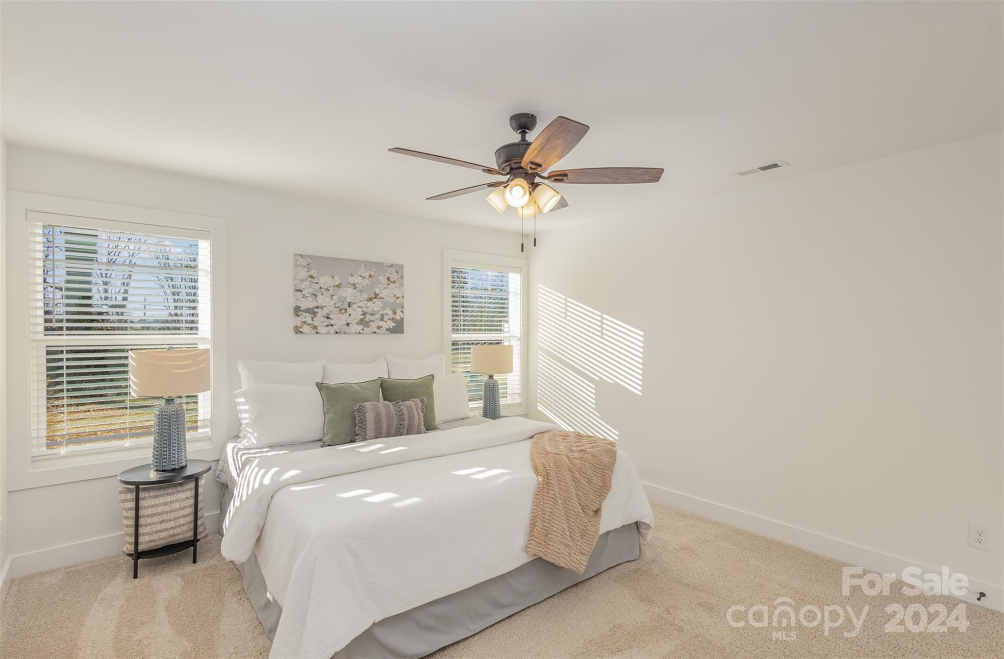 2832 South Ridge Avenue Concord, NC 28025 - Photo 13 of 18 a bedroom with a bed and a ceiling fan