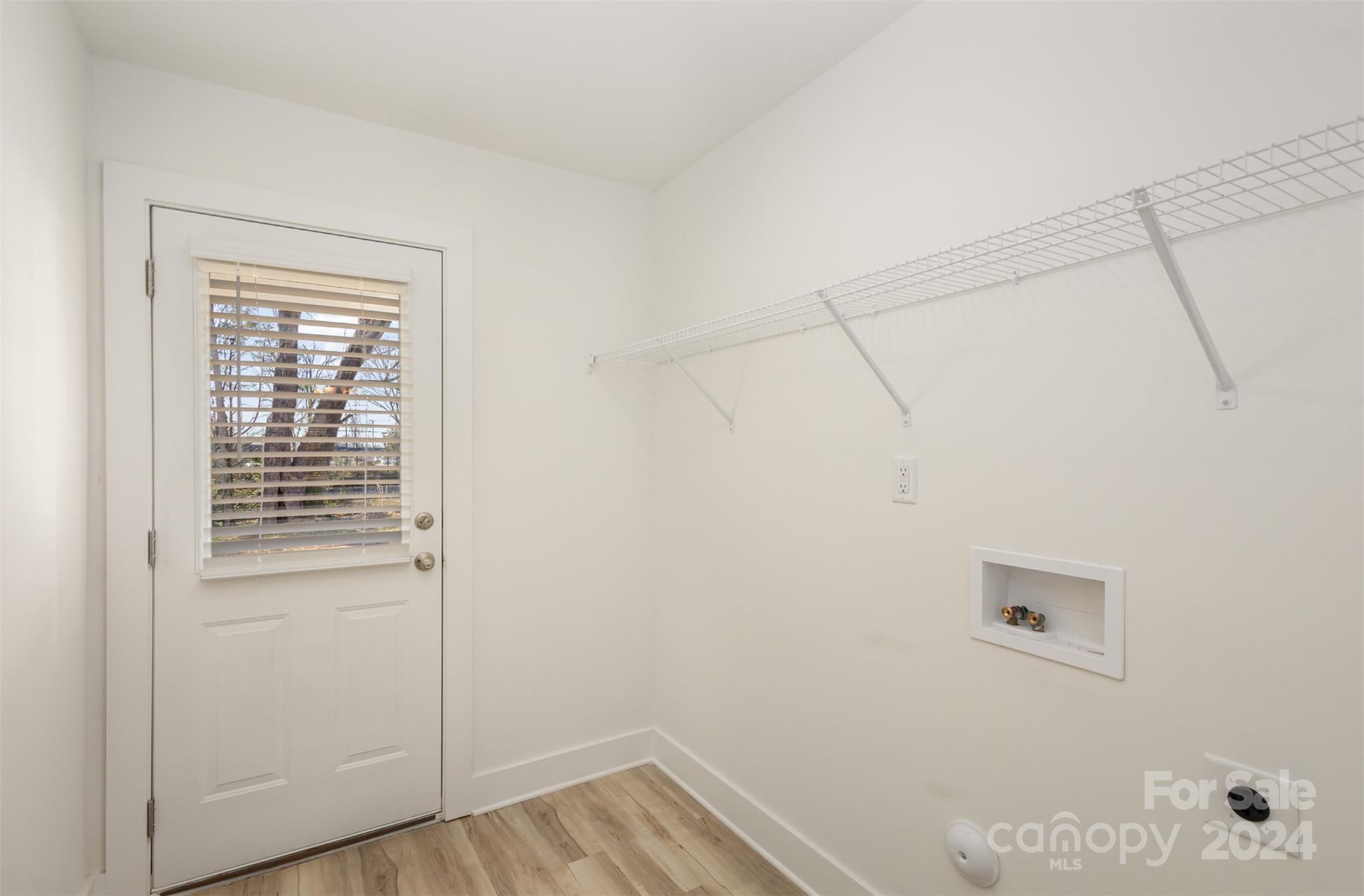 2832 South Ridge Avenue Concord, NC 28025 - Photo 18 of 18 a view of a small space with wooden floor and a window
