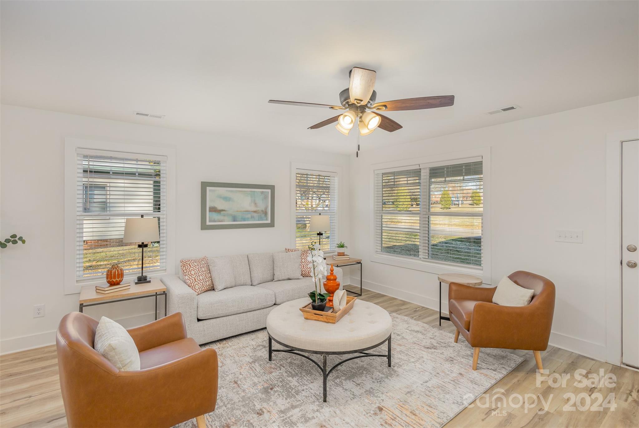 2832 South Ridge Avenue Concord, NC 28025 - Photo 2 of 18 a living room with furniture and a large window