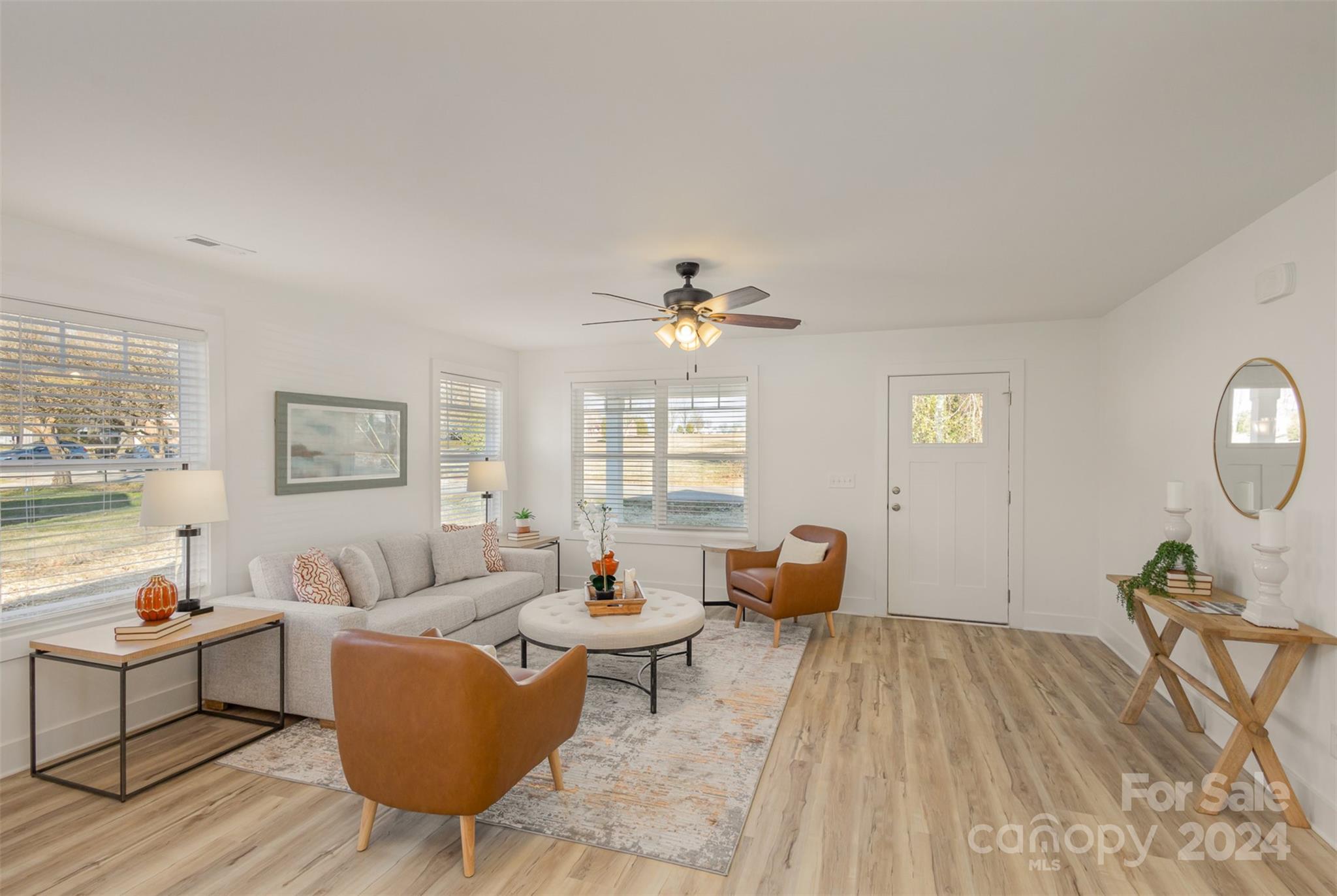 2832 South Ridge Avenue Concord, NC 28025 - Photo 4 of 18 a living room with furniture and wooden floor