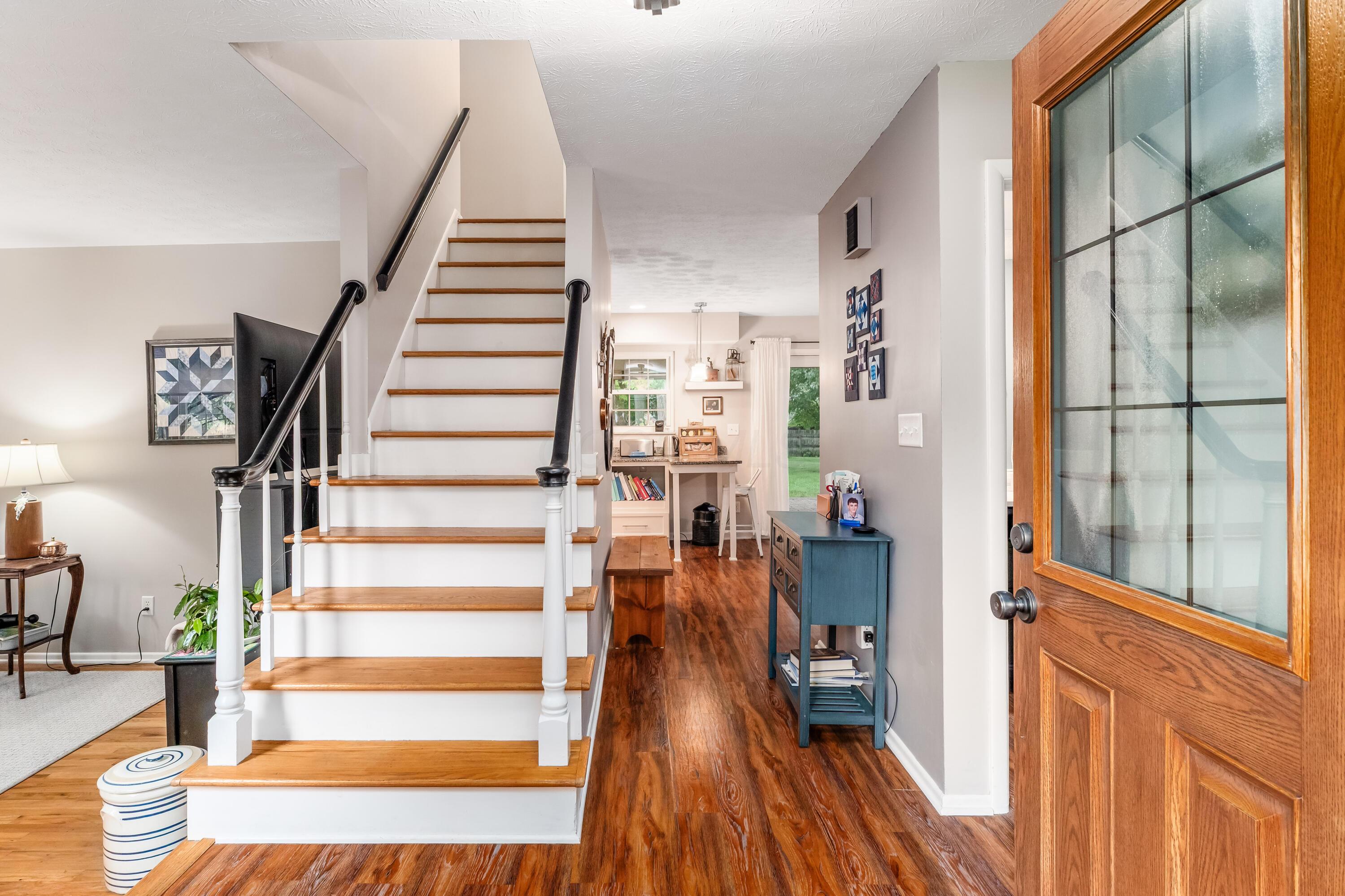 5568 Naiche Road Columbus, OH 43213 - Photo 6 of 42 Staircase to the upper level as you first enter the house