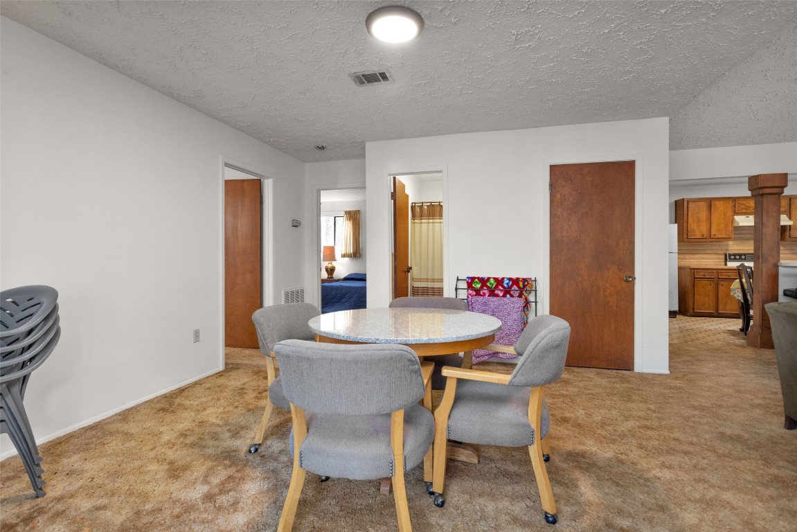 7415 Honea Egypt Road Montgomery, TX 77316 - Photo 26 of 50 a dining room with furniture and window