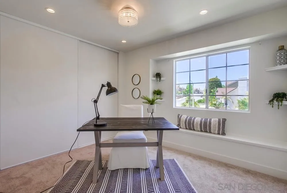 1376 Darwin Drive Oceanside, CA 92056 - Photo 47 of 63 a view of a room with a window and wooden floor