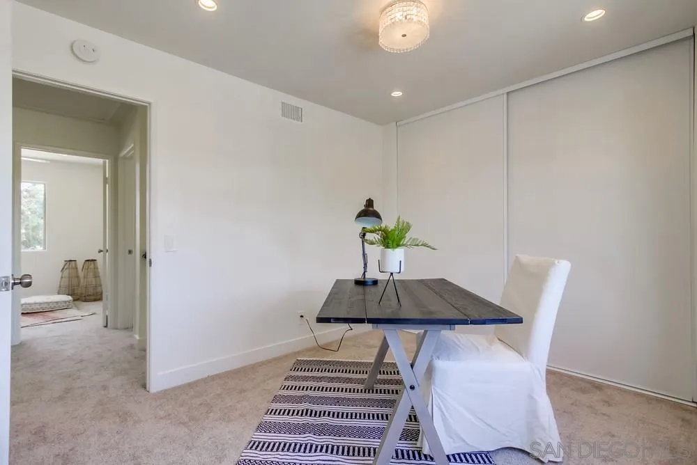 1376 Darwin Drive Oceanside, CA 92056 - Photo 48 of 63 a living room with furniture and wooden floor