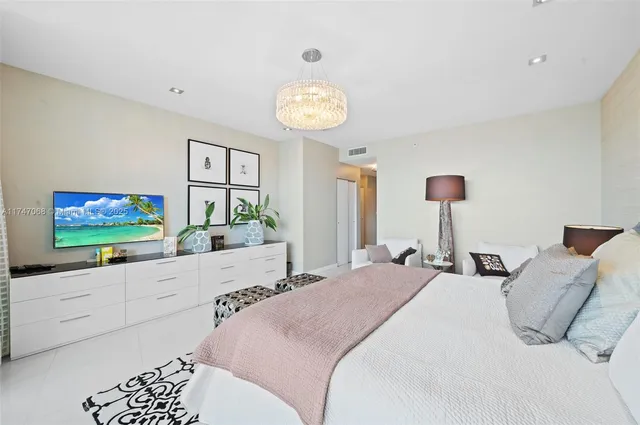 a bathroom with a sink vanity and mirror