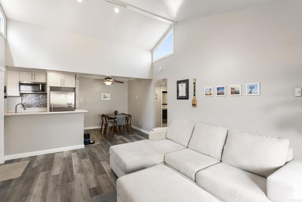 2920 Briarwood Road, Unit G11 Bonita, CA 91902 - Photo 7 of 23 a living room with furniture and kitchen view