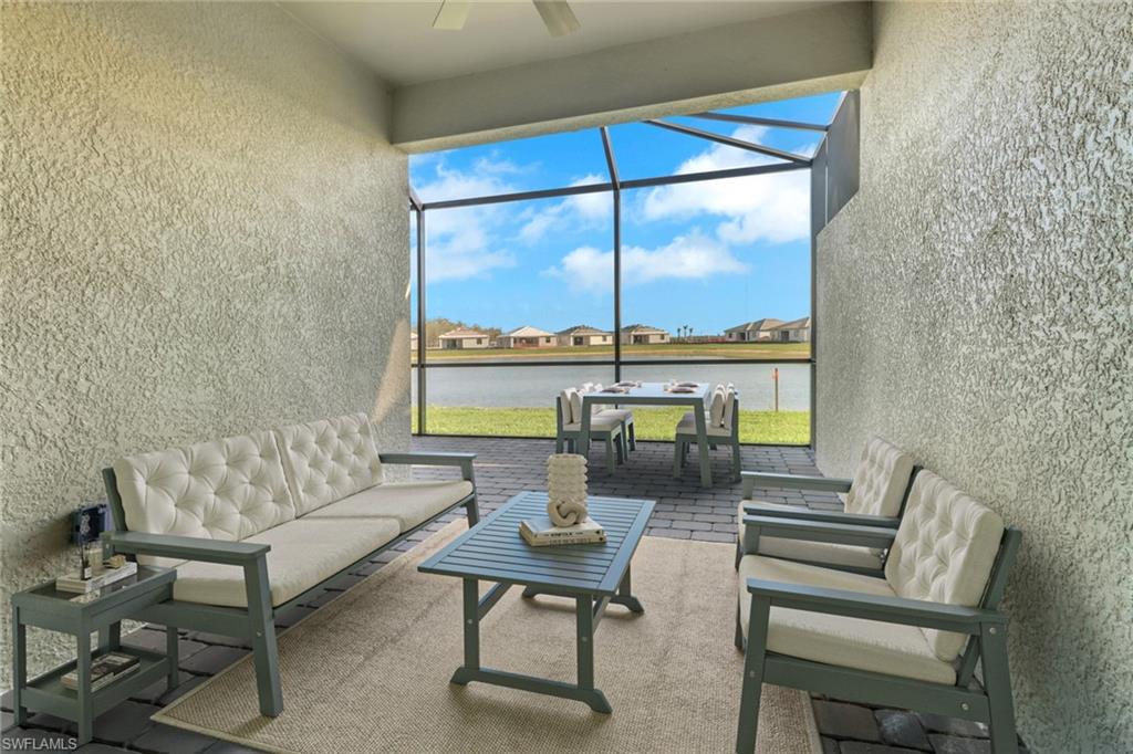 19513 Hinkley Drive Estero, FL 33928 - Photo 23 of 38 a living room with furniture and a window