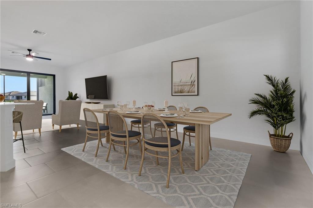 19513 Hinkley Drive Estero, FL 33928 - Photo 8 of 38 a view of a dining room with furniture