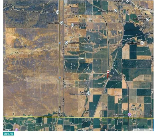 an aerial view of residential building and parking space