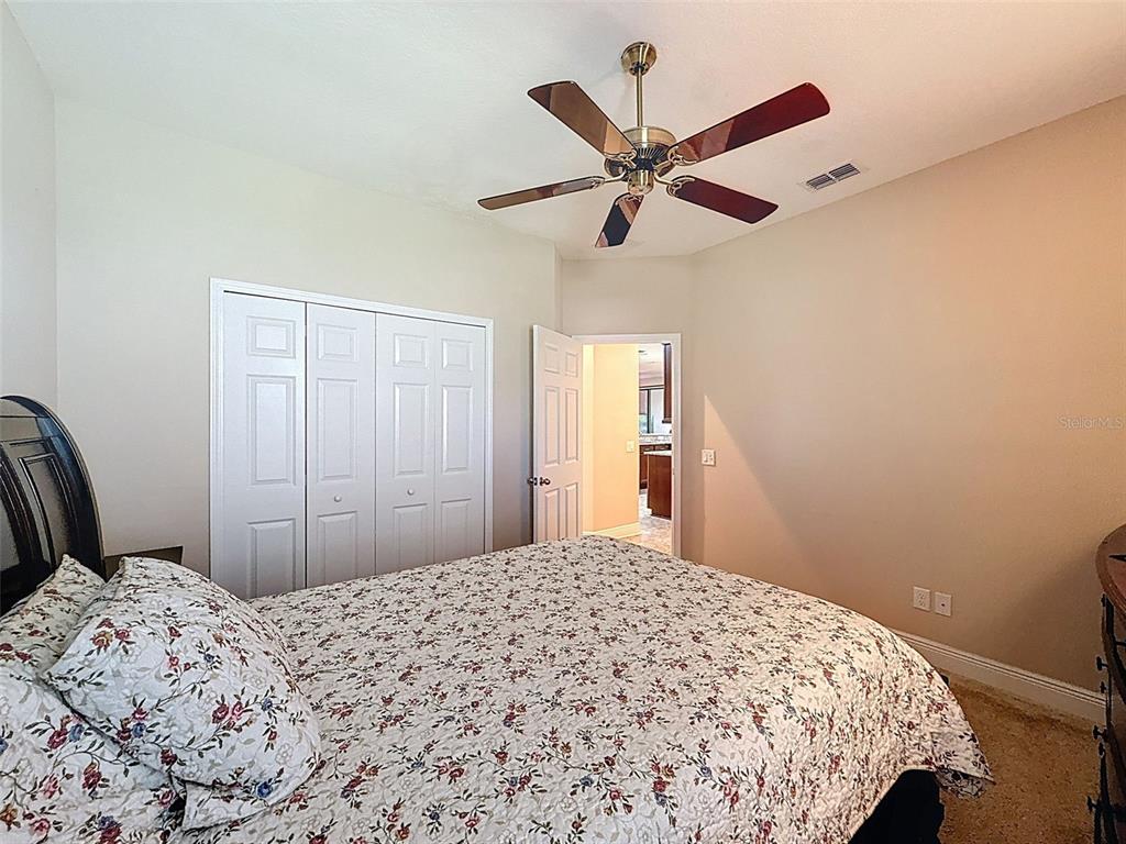 335 Cockle Shell Loop Apollo Beach, FL 33572 - Photo 37 of 90 a bedroom with a bed and a window