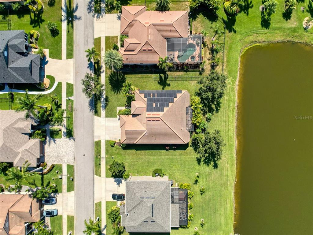 335 Cockle Shell Loop Apollo Beach, FL 33572 - Photo 59 of 90 an aerial view of a house with a garden