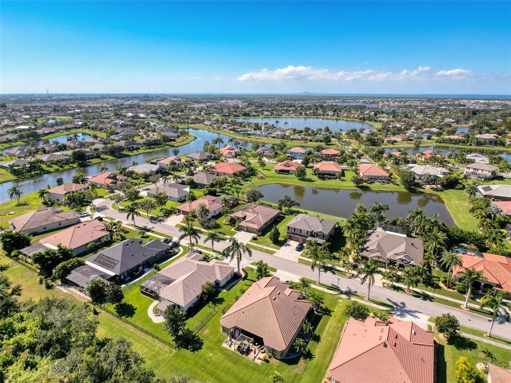 335 Cockle Shell Loop Apollo Beach, FL 33572 - Photo 61 of 90 an aerial view of residential houses with city view