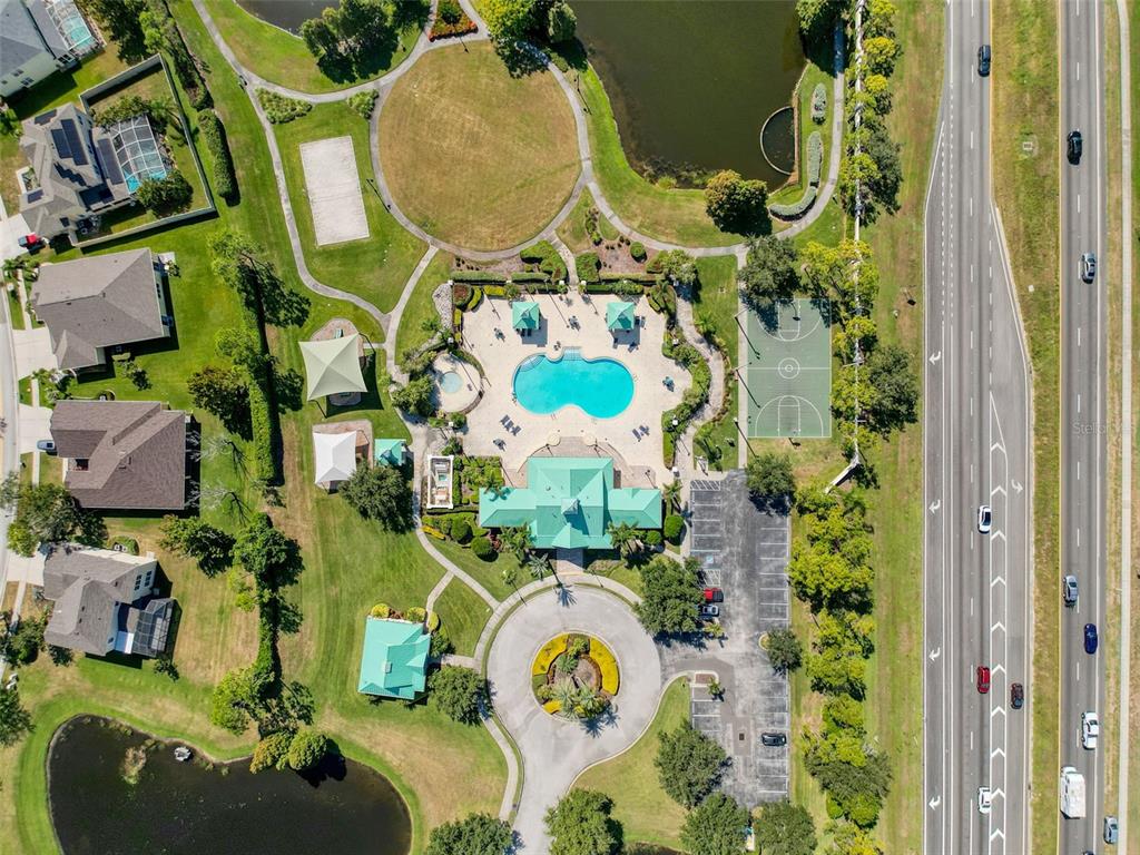 335 Cockle Shell Loop Apollo Beach, FL 33572 - Photo 70 of 90 an aerial view of a house with swimming pool and outdoor space