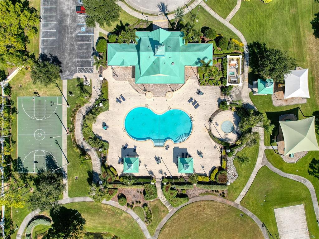 335 Cockle Shell Loop Apollo Beach, FL 33572 - Photo 72 of 90 an aerial view of a house with a swimming pool and outdoor seating