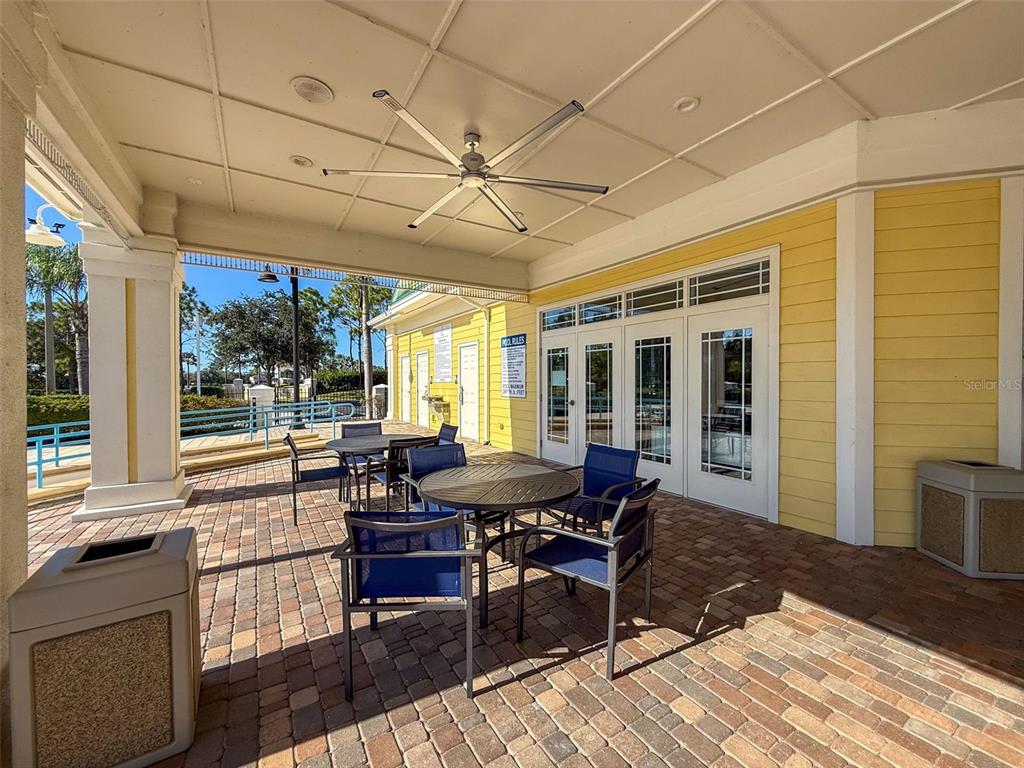 335 Cockle Shell Loop Apollo Beach, FL 33572 - Photo 81 of 90 a view of a dining room with furniture window and outside view