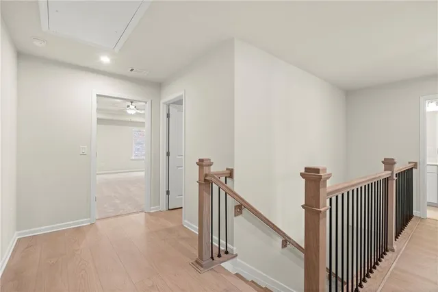 a view of a hallway with sliding door