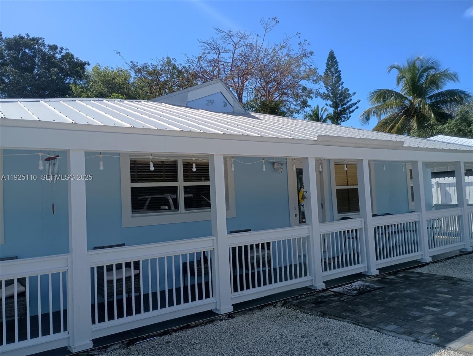 29 Bonefish Avenue Key Largo, FL 33037 - Photo 2 of 31 a view of a house with a porch