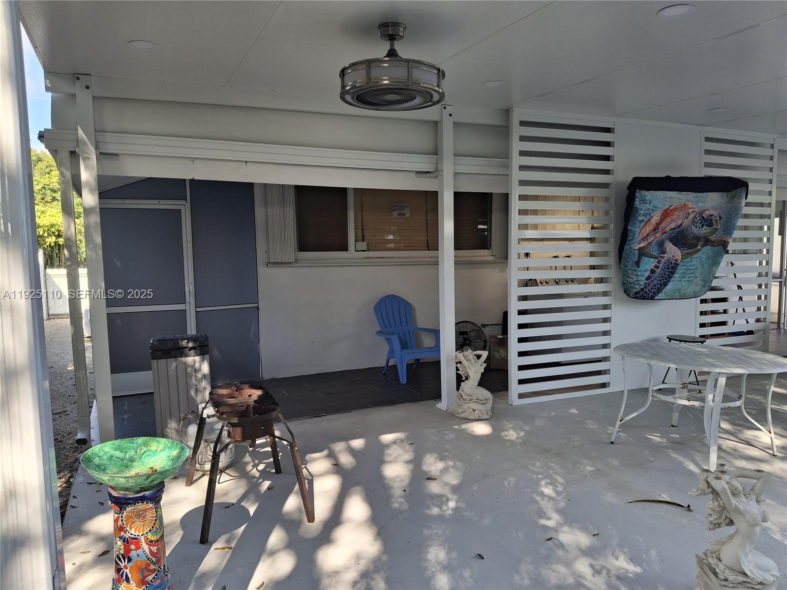 29 Bonefish Avenue Key Largo, FL 33037 - Photo 22 of 31 a front view of a house with patio