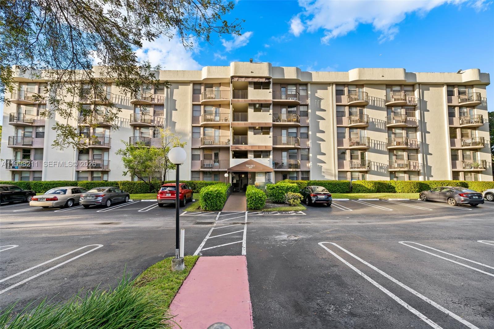 2771 Riverside Drive, Unit 316A Coral Springs, FL 33065 - Photo 1 of 20 a front view of a building with street view