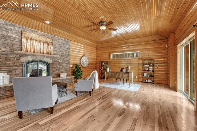 15975 Winding Trail Road Colorado Springs, CO 80908 - Photo 30 of 50 Just off the Primary Suite is your very own Retreat with space for seating and a home office