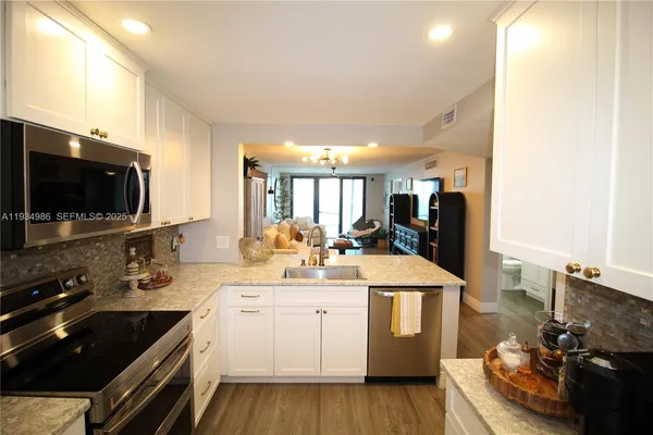 a bedroom with a bed and a cabinets