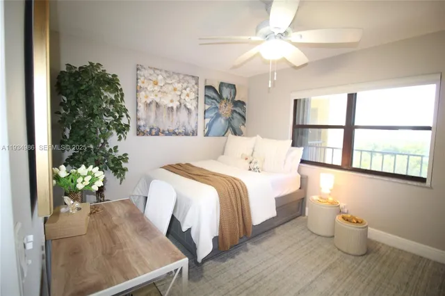a bathroom with a granite countertop sink toilet and a mirror