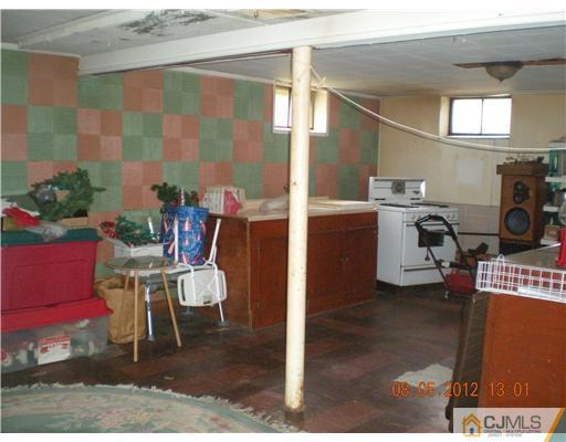 15 Harvard Road Old Bridge, NJ 08859 - Photo 17 of 20 a dining room with a table and chairs