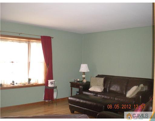 15 Harvard Road Old Bridge, NJ 08859 - Photo 8 of 20 a living room with furniture and window