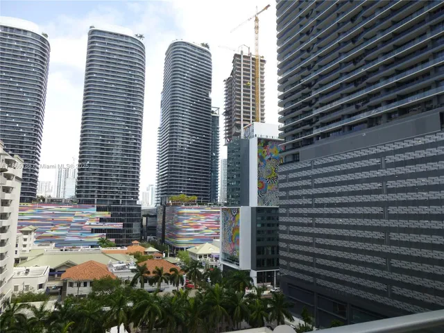 a view of a city with tall buildings