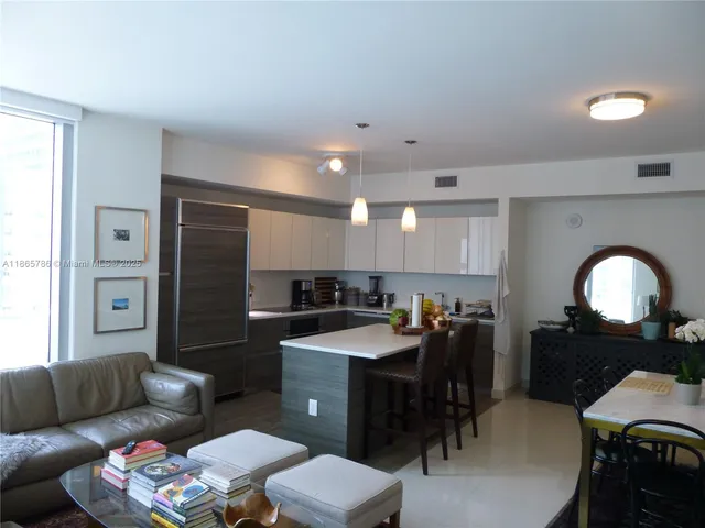 a view of a livingroom with furniture and a livingroom