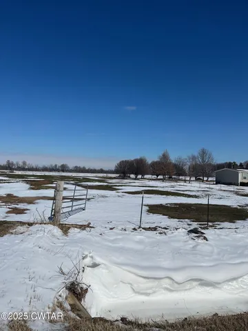 a view of a lake with beach