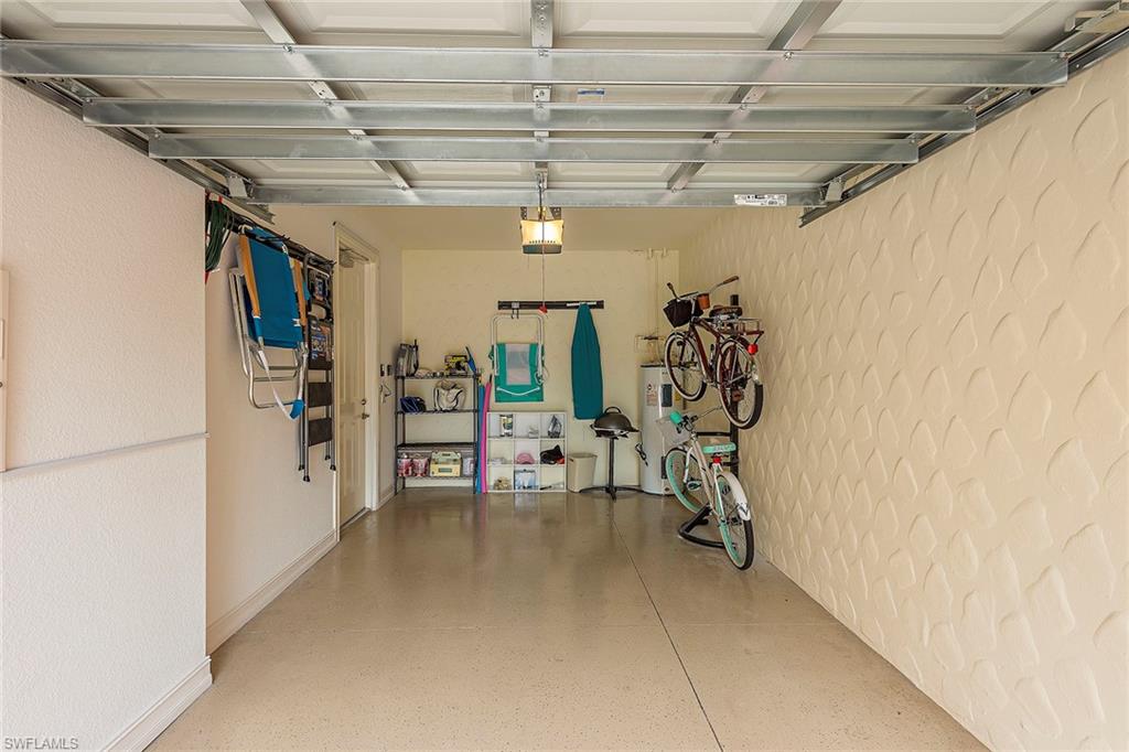 9102 Capistrano Street South, Unit 723 Naples, FL 34113 - Photo 12 of 12 a view of a room with gym equipment