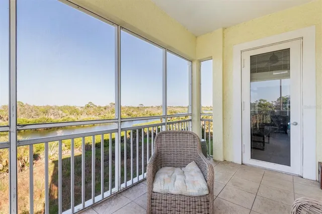 a bedroom with a bed and a mirror