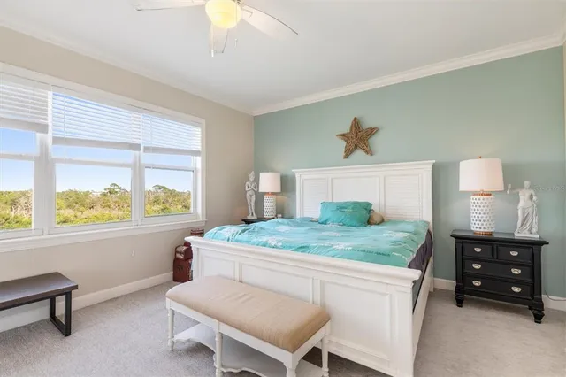 a bed room with a bed and a window