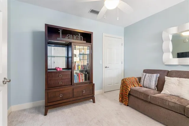 a view of a large building with a yard