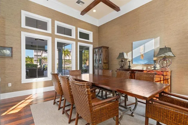 a living room with furniture a window and a table