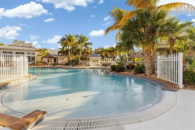 a view of a swimming pool with a patio