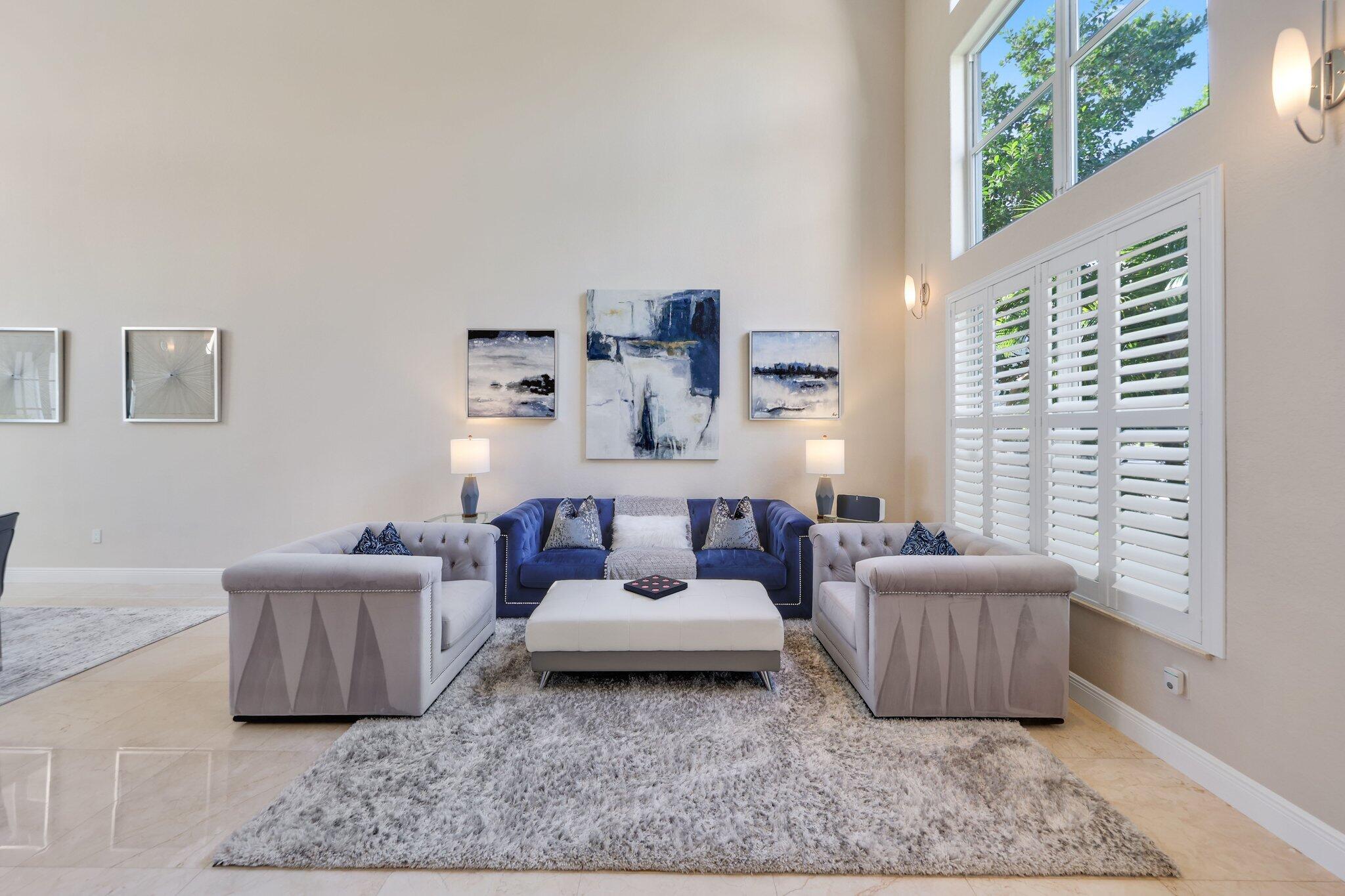 19245 Skyridge Circle Boca Raton, FL 33498 - Photo 6 of 70 a living room with furniture and a rug