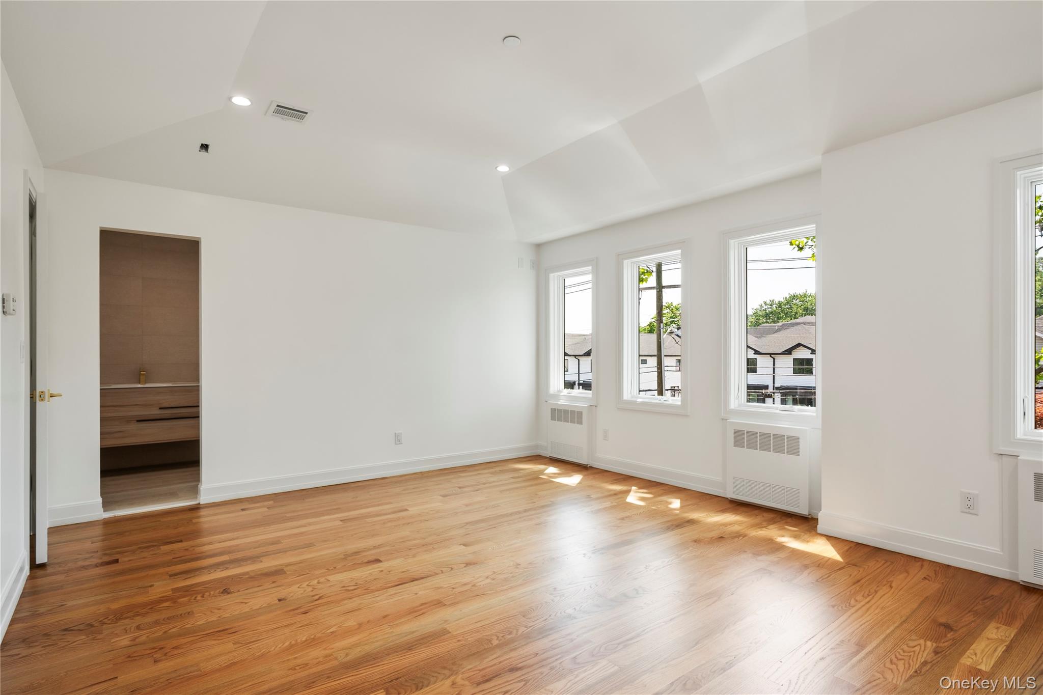 130 Union Road, Unit 201 Spring Valley, NY 10977 - Photo 21 of 47 an empty room with wooden floor and windows