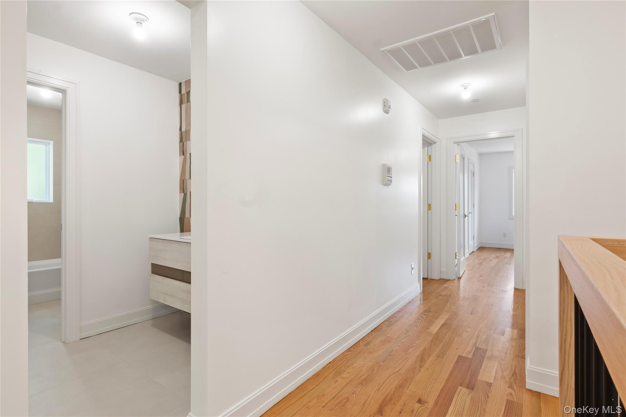 130 Union Road, Unit 201 Spring Valley, NY 10977 - Photo 29 of 47 a view of a hallway with wooden floor