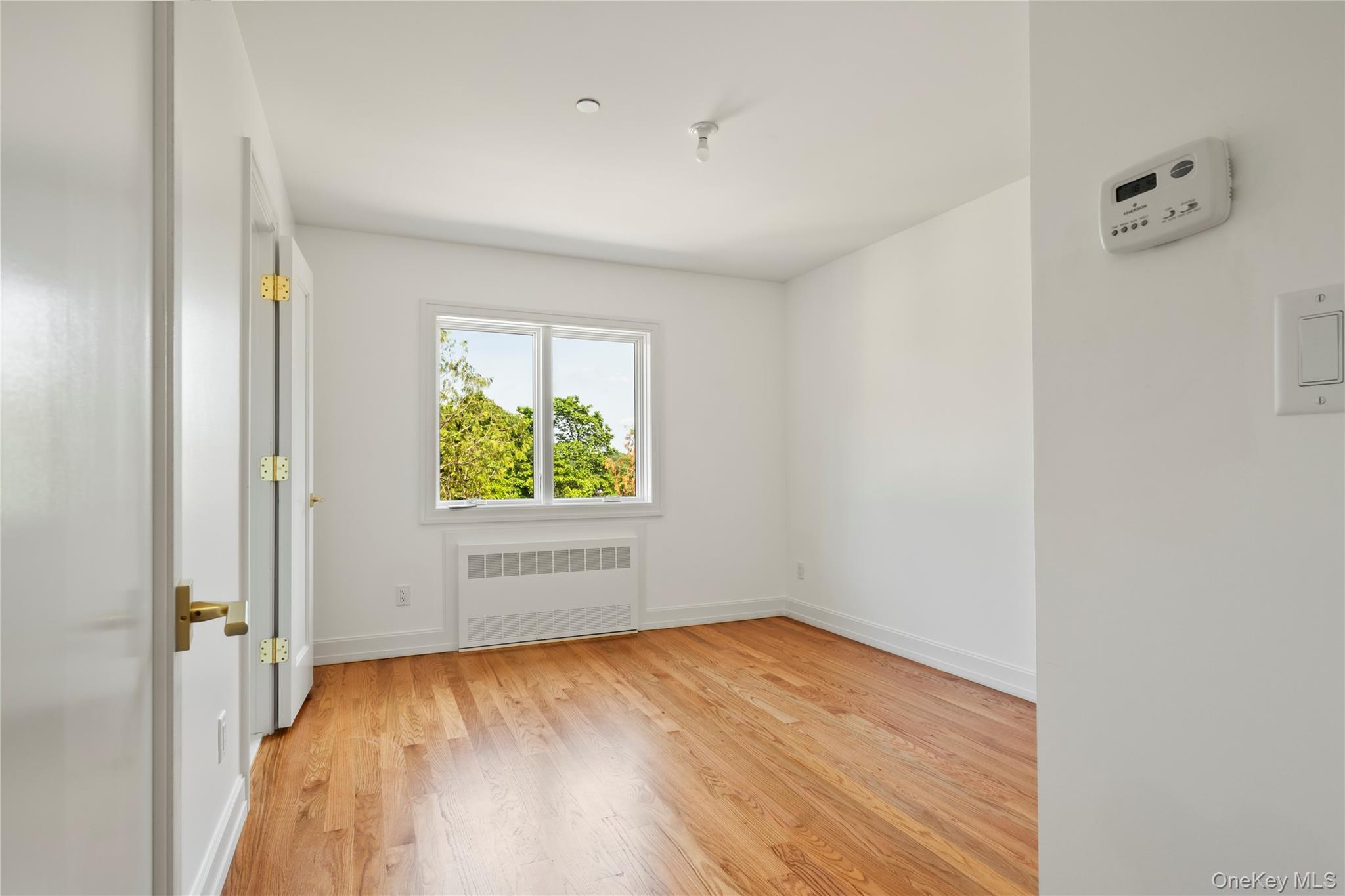 130 Union Road, Unit 201 Spring Valley, NY 10977 - Photo 31 of 47 an empty room with a window