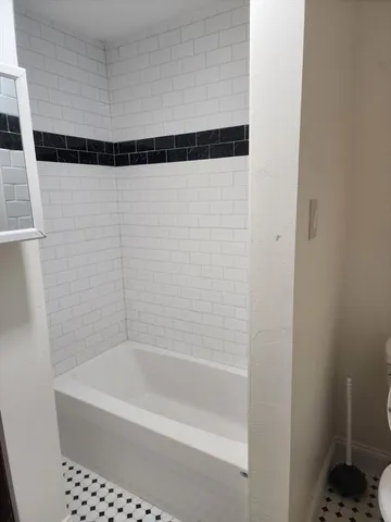 a bathroom with a bathtub