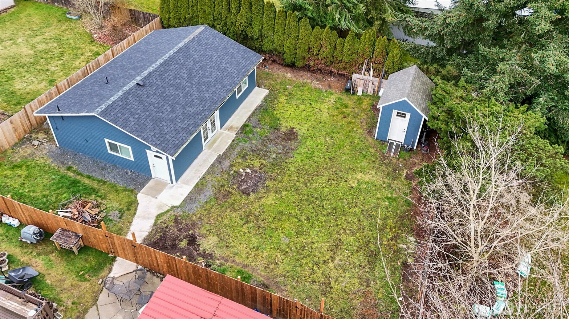 7826 Rainier Drive, Unit B Everett, WA 98203 - Photo 1 of 1 a aerial view of a house with garden